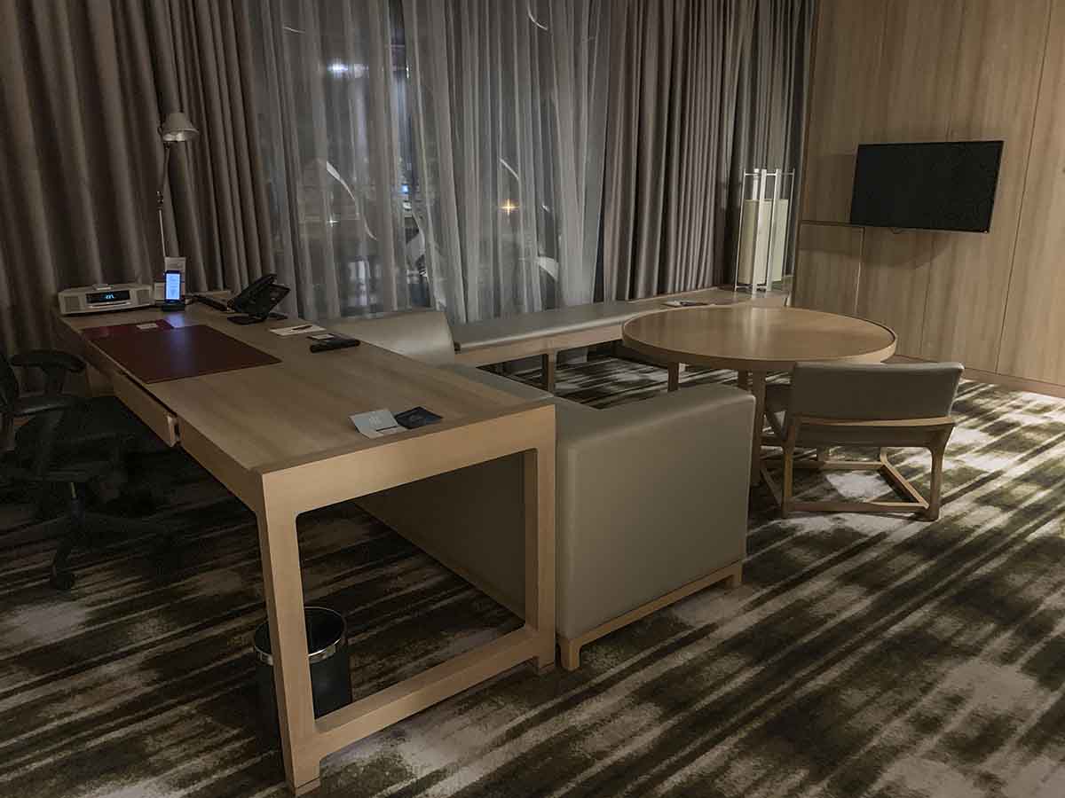 Crowne Plaza Changi Airport suite desk and couch