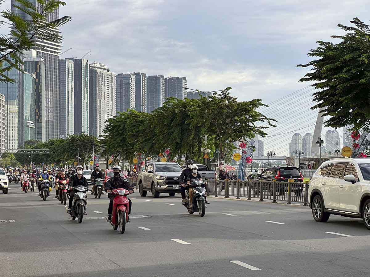 Main street with motorbikes in hotels in the distance