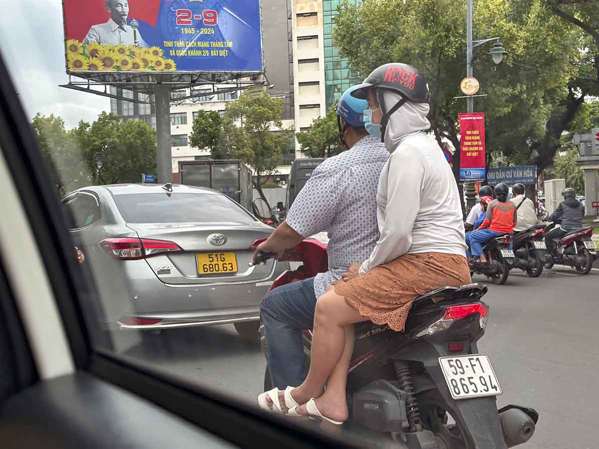 Motor bikes and cars on the streets of Ho Chi Minh City